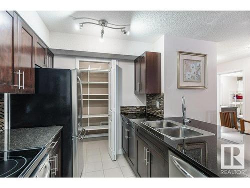 213 530 Watt Boulevard Sw, Edmonton, AB - Indoor Photo Showing Kitchen With Double Sink