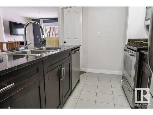 213 530 Watt Boulevard Sw, Edmonton, AB - Indoor Photo Showing Kitchen With Double Sink