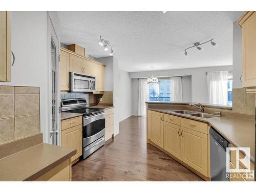 #7 1128 156 Street Nw, Edmonton, AB - Indoor Photo Showing Kitchen With Double Sink