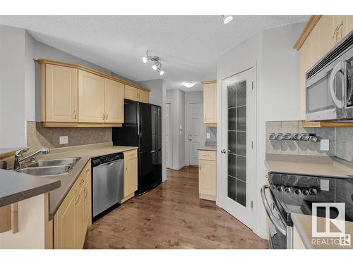 #7 1128 156 Street Nw, Edmonton, AB - Indoor Photo Showing Kitchen With Double Sink