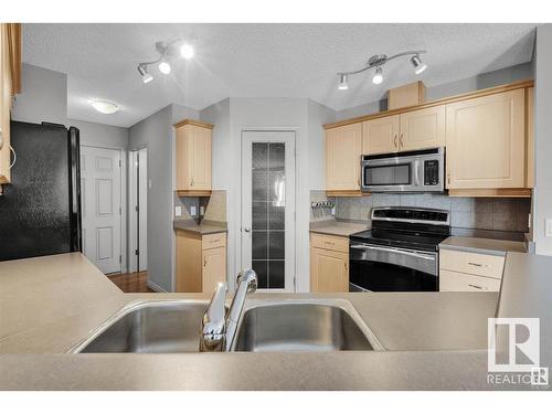 #7 1128 156 Street Nw, Edmonton, AB - Indoor Photo Showing Kitchen With Double Sink