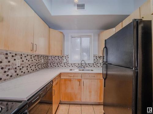 406 10707 102 Avenue, Edmonton, AB - Indoor Photo Showing Kitchen With Double Sink