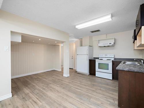 3439 40 Street, Edmonton, AB - Indoor Photo Showing Kitchen With Double Sink