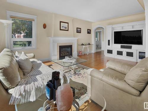 7314 Ada Boulevard, Edmonton, AB - Indoor Photo Showing Living Room With Fireplace