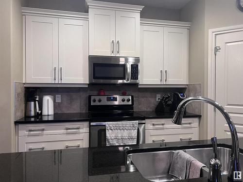 4010 Charles Place Sw, Edmonton, AB - Indoor Photo Showing Kitchen With Double Sink With Upgraded Kitchen