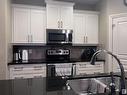 4010 Charles Place Sw, Edmonton, AB  - Indoor Photo Showing Kitchen With Double Sink With Upgraded Kitchen 