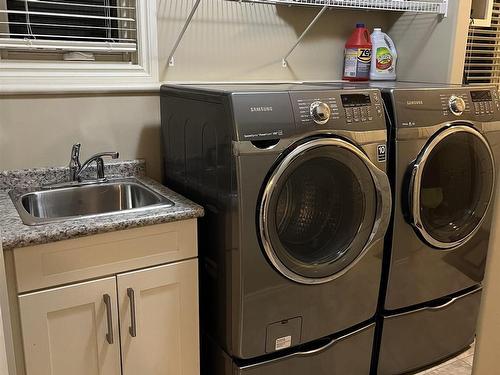 4010 Charles Place Sw, Edmonton, AB - Indoor Photo Showing Laundry Room