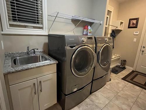 4010 Charles Place Sw, Edmonton, AB - Indoor Photo Showing Laundry Room