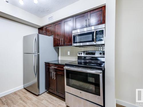 204 5816 Mullen Place, Edmonton, AB - Indoor Photo Showing Kitchen With Stainless Steel Kitchen