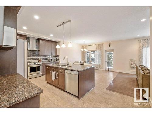 65 Caragana Way, Fort Saskatchewan, AB - Indoor Photo Showing Kitchen With Upgraded Kitchen