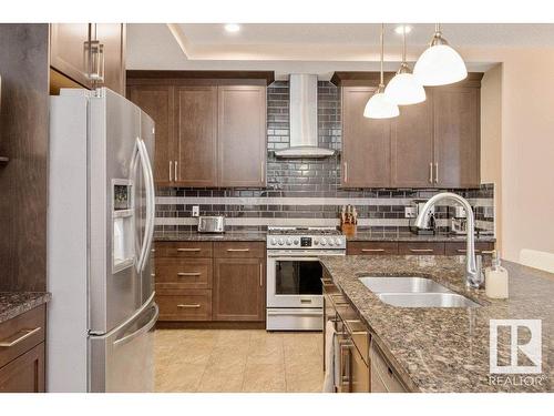 65 Caragana Way, Fort Saskatchewan, AB - Indoor Photo Showing Kitchen With Double Sink With Upgraded Kitchen