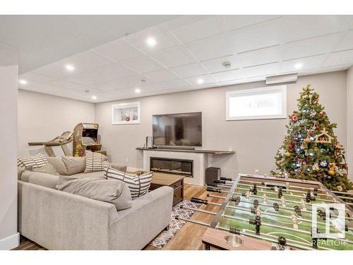 65 Caragana Way, Fort Saskatchewan, AB - Indoor Photo Showing Basement With Fireplace