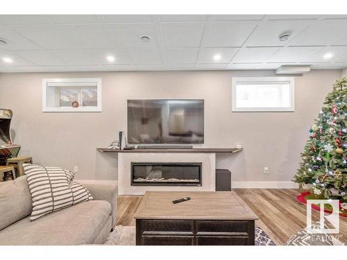 65 Caragana Way, Fort Saskatchewan, AB - Indoor Photo Showing Basement With Fireplace