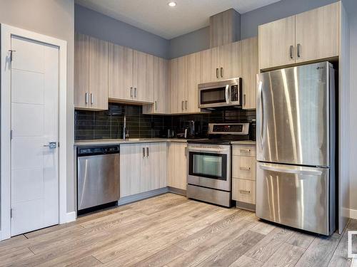 403 10238 103 Street, Edmonton, AB - Indoor Photo Showing Kitchen With Stainless Steel Kitchen