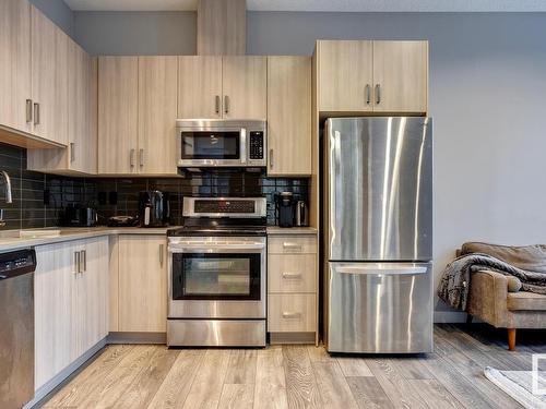 403 10238 103 Street, Edmonton, AB - Indoor Photo Showing Kitchen With Stainless Steel Kitchen