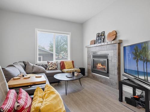 9863 73 Avenue, Edmonton, AB - Indoor Photo Showing Living Room With Fireplace