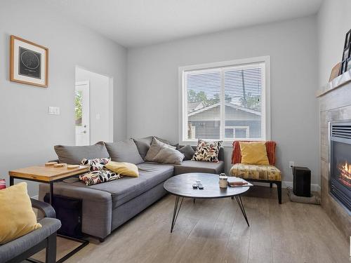 9863 73 Avenue, Edmonton, AB - Indoor Photo Showing Living Room With Fireplace