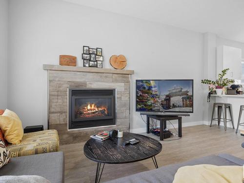 9863 73 Avenue, Edmonton, AB - Indoor Photo Showing Living Room With Fireplace