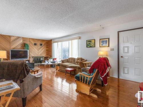 532077 Rr180, Rural Lamont County, AB - Indoor Photo Showing Living Room With Fireplace