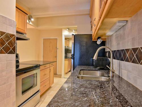 603 9918 101 Street, Edmonton, AB - Indoor Photo Showing Kitchen With Double Sink