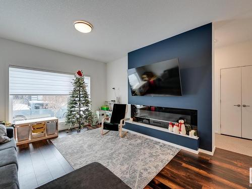 34 Brunswyck Crescent, Spruce Grove, AB - Indoor Photo Showing Living Room With Fireplace