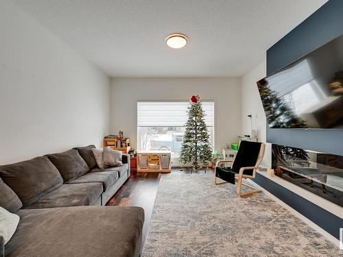 34 Brunswyck Crescent, Spruce Grove, AB - Indoor Photo Showing Living Room With Fireplace