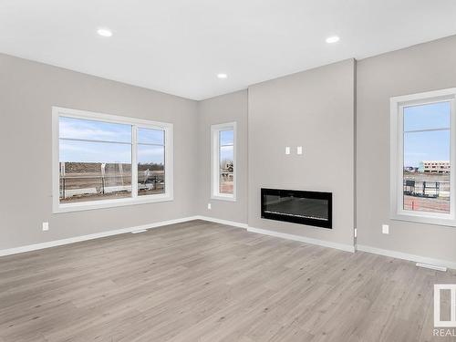 175 Catria Point(E) N, Sherwood Park, AB - Indoor Photo Showing Living Room With Fireplace