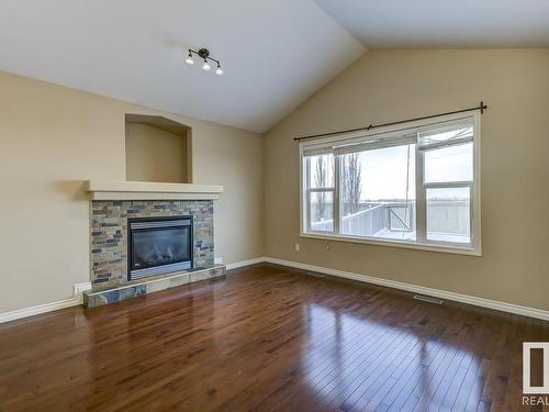 8106 97 Street, Morinville, AB - Indoor Photo Showing Living Room With Fireplace