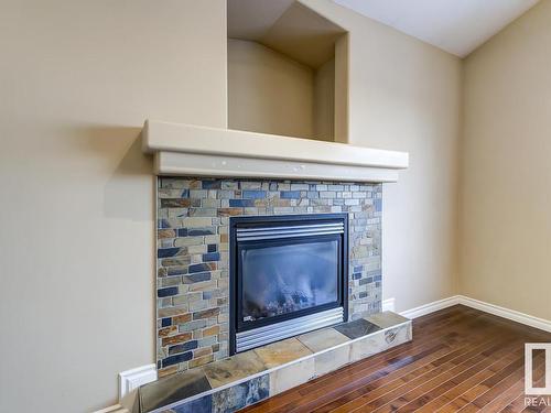 8106 97 Street, Morinville, AB - Indoor Photo Showing Living Room With Fireplace