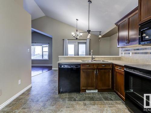 8106 97 Street, Morinville, AB - Indoor Photo Showing Kitchen With Double Sink