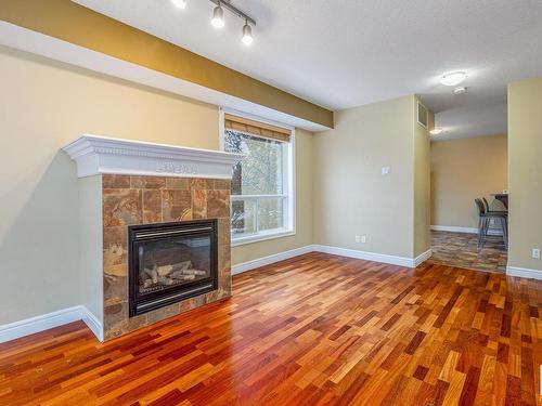 10903 81 Avenue, Edmonton, AB - Indoor Photo Showing Living Room With Fireplace