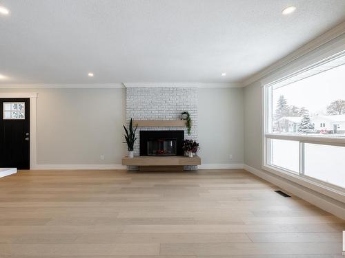 9211 99A Avenue, Morinville, AB - Indoor Photo Showing Other Room With Fireplace