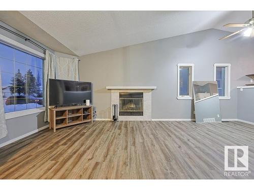 453 Garden Meadows Drive, Wetaskiwin, AB - Indoor Photo Showing Living Room With Fireplace