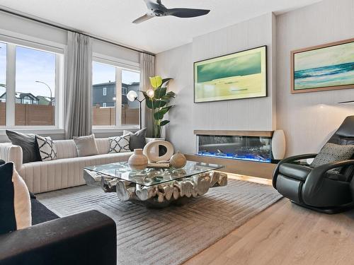 3937 3A Avenue, Edmonton, AB - Indoor Photo Showing Living Room With Fireplace