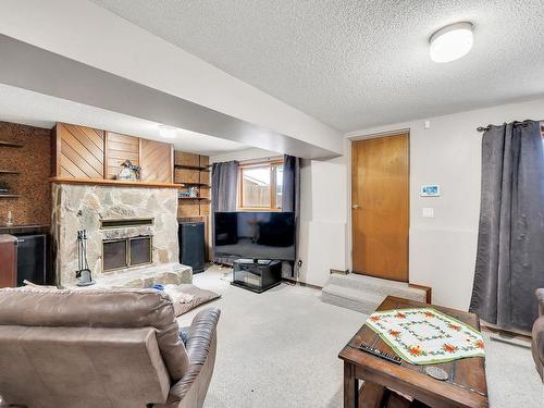 9223 168 Street, Edmonton, AB - Indoor Photo Showing Living Room With Fireplace