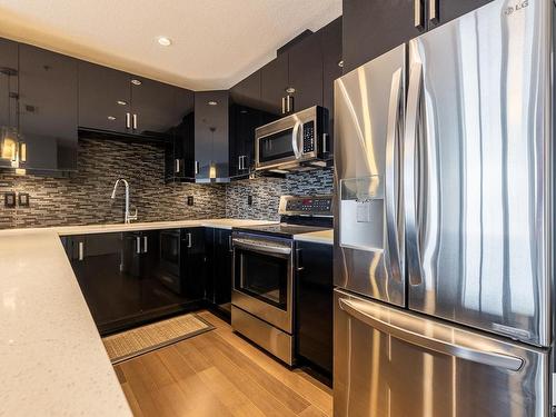 705 10238 103 Street, Edmonton, AB - Indoor Photo Showing Kitchen With Stainless Steel Kitchen With Upgraded Kitchen