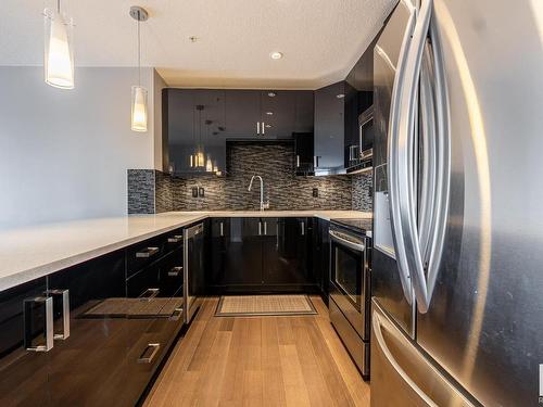 705 10238 103 Street, Edmonton, AB - Indoor Photo Showing Kitchen With Stainless Steel Kitchen With Upgraded Kitchen