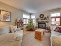 10841 128 Street, Edmonton, AB  - Indoor Photo Showing Living Room With Fireplace 