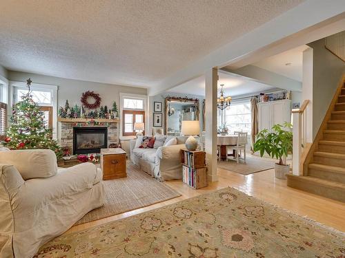 10841 128 Street, Edmonton, AB - Indoor Photo Showing Living Room With Fireplace