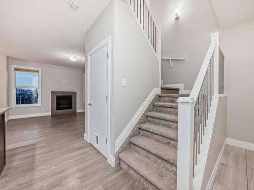 161 Harvest Ridge Drive, Spruce Grove, AB - Indoor Photo Showing Other Room With Fireplace