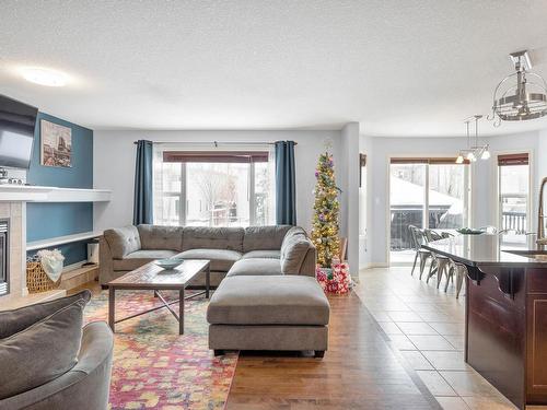 1409 37A Avenue, Edmonton, AB - Indoor Photo Showing Living Room With Fireplace