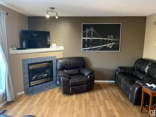 16219 93 Street, Edmonton, AB - Indoor Photo Showing Living Room With Fireplace