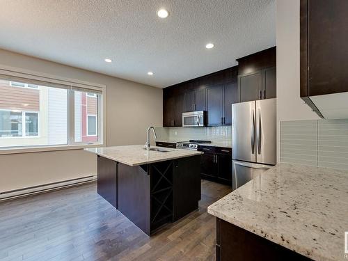 7506 May Common, Edmonton, AB - Indoor Photo Showing Kitchen With Double Sink