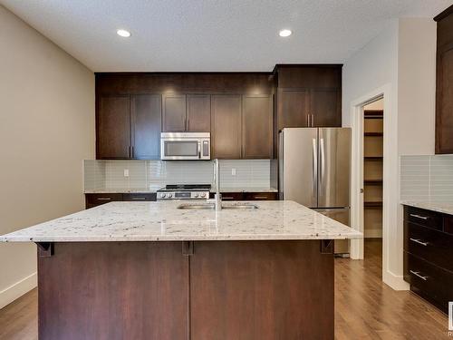 7506 May Common, Edmonton, AB - Indoor Photo Showing Kitchen With Upgraded Kitchen