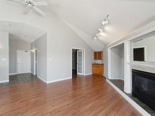 409 15499 Castle Downs Road, Edmonton, AB - Indoor Photo Showing Living Room With Fireplace