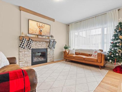 176 Henderson Link, Spruce Grove, AB - Indoor Photo Showing Living Room With Fireplace