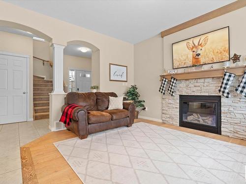 176 Henderson Link, Spruce Grove, AB - Indoor Photo Showing Living Room With Fireplace