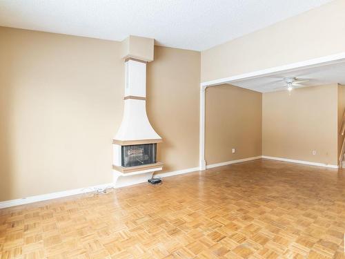 11131 130 Street, Edmonton, AB - Indoor Photo Showing Other Room With Fireplace