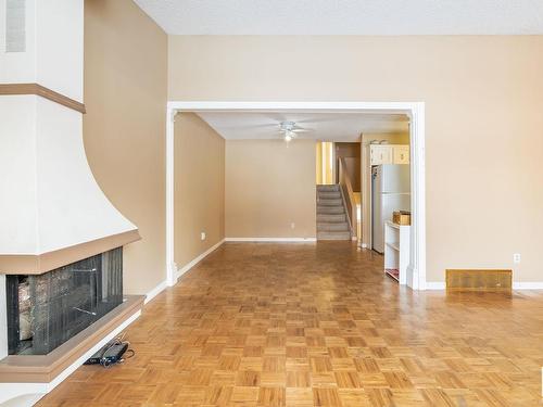 11131 130 Street, Edmonton, AB - Indoor Photo Showing Other Room With Fireplace