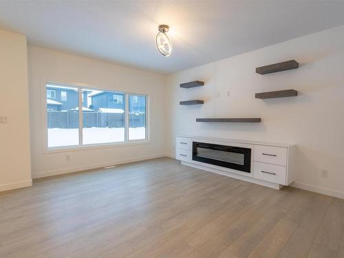 69 Penn Place, Spruce Grove, AB - Indoor Photo Showing Living Room With Fireplace